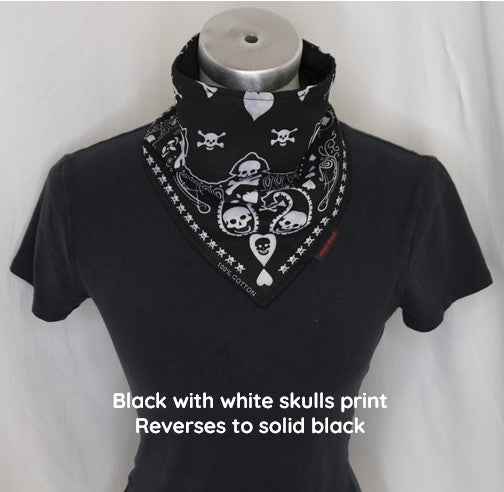 Black absorbent bandana with white skulls print, reverses to solid black